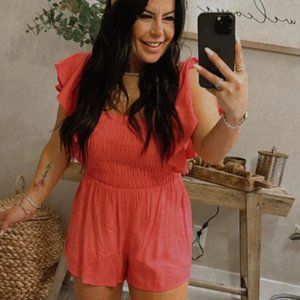 NWT Pink Scalloped Sleeve Smocked Bust Romper